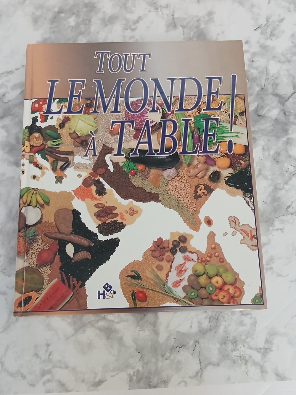Tout le Monde à Table! Livre de recettes relié | Cuisine du monde